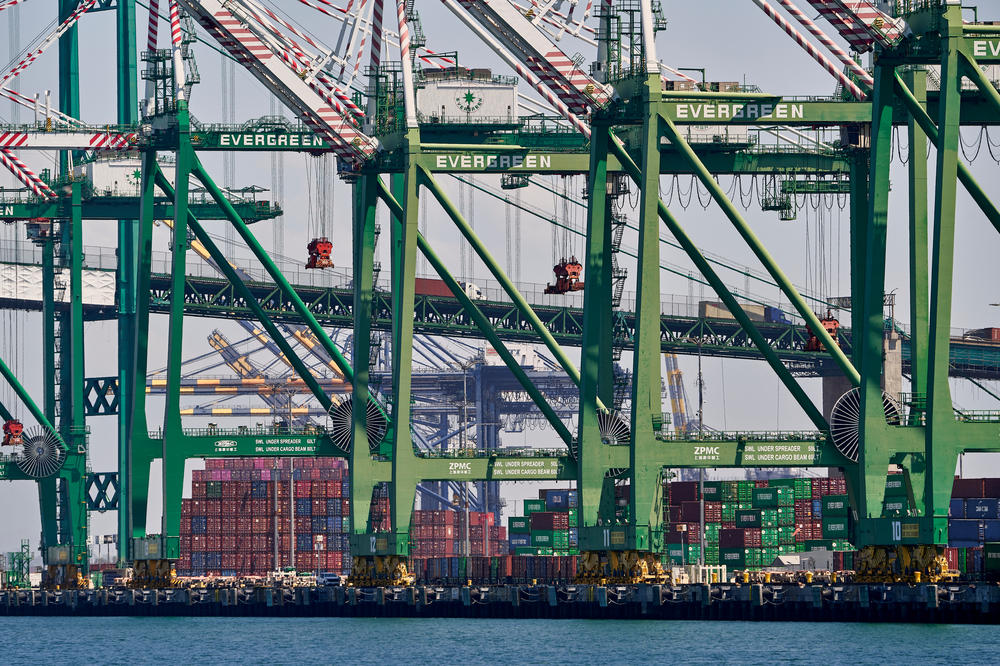 At the Port of Los Angeles, cranes stand ready for the arrival of a container ship. Approximately 40% of containerized imports coming into the U.S. come through the Ports of L.A. and Long Beach.