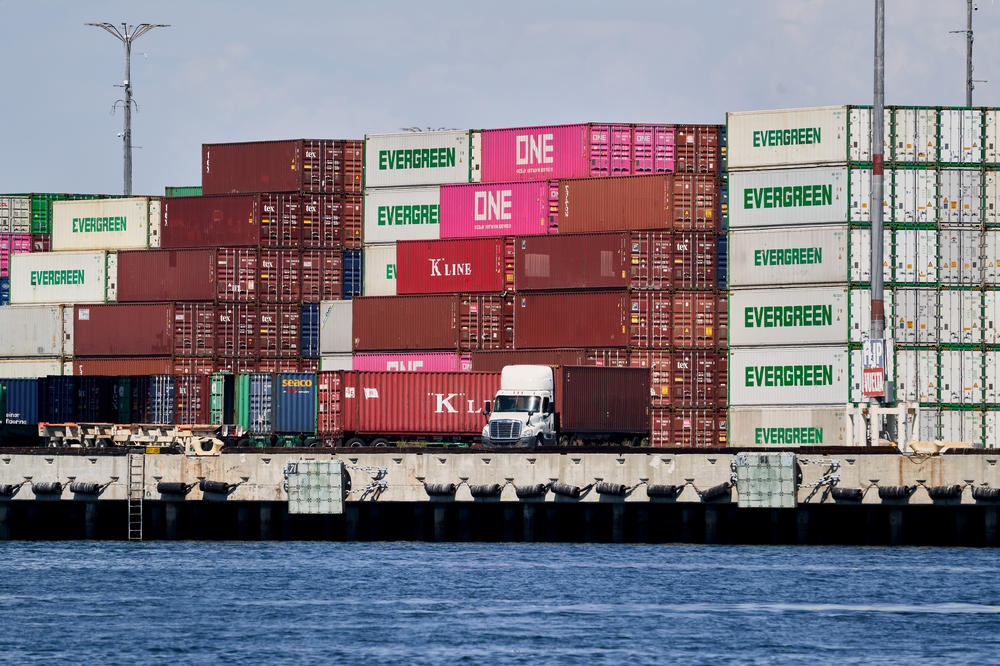 Shipping containers are stacked high at the Port of Los Angeles.