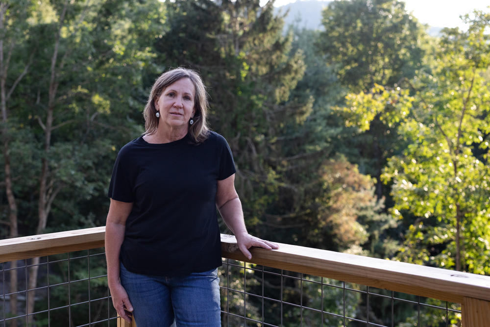 Karen Douthitt learned that a cousin on her mother's side had undergone genetic testing and was found to be a carrier of presenilin 1, a rare genetic mutation for early-onset Alzheimer's dementia. The cousin had developed the disease in her 50s.