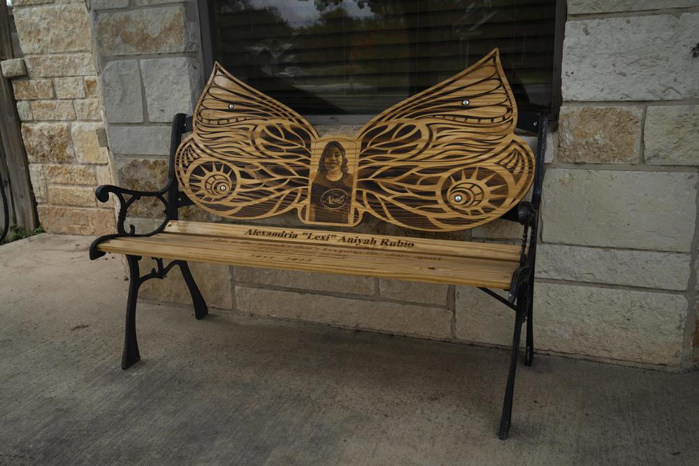 A Georgia resident handmade wooden benches like these for each of the 21 victims of the Robb shooting. Lexi's is placed at the entrance of the Rubio's home.
