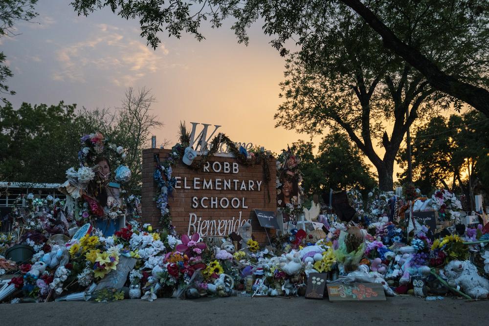 A makeshift memorial stands at Robb Elementary School, which has been permanently closed in Uvalde.