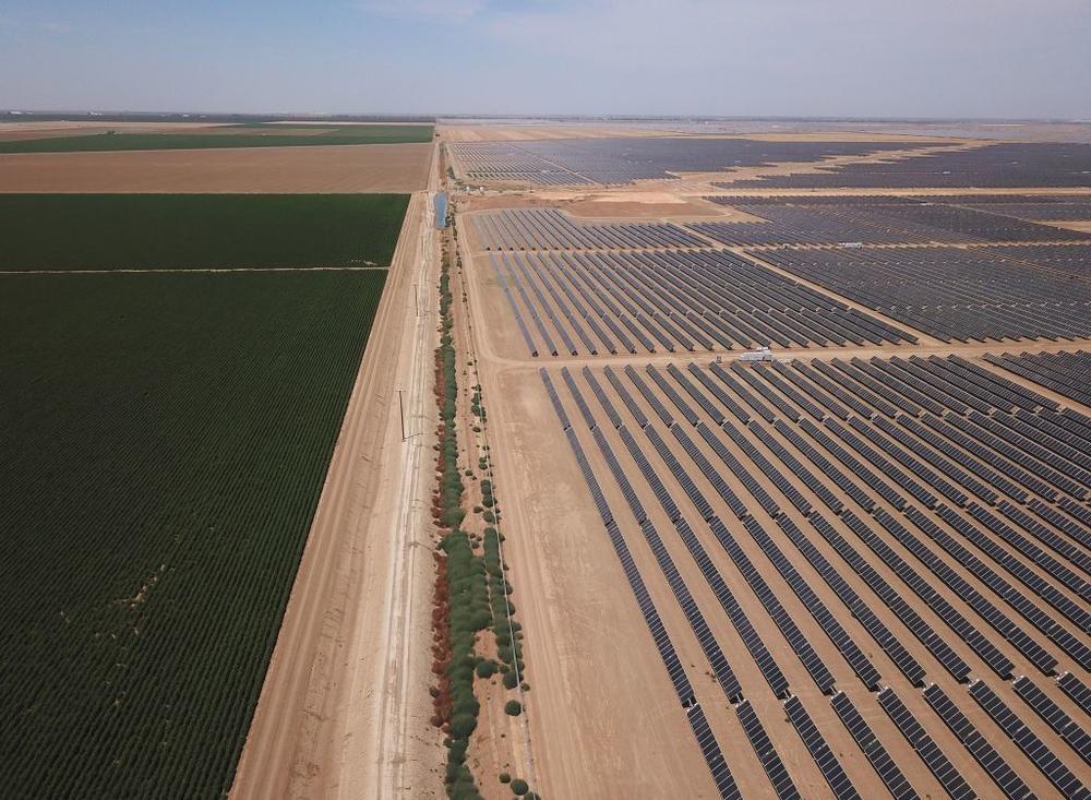 ESG is different from impact investing, where the goal is to make money by investing in companies that are trying to achieve certain social or environmental outcomes, such as building renewable energy projects like this solar farm in California.
