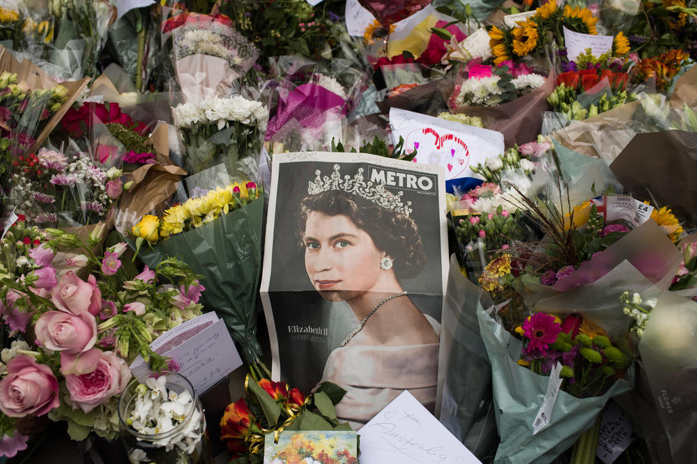 Tributes from well-wishers outside Buckingham Palace on Friday, the first day of public mourning following the death of Queen Elizabeth II.