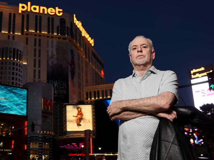<em>Las Vegas Review-Journal</em> reporter Jeff German stands on the Las Vegas Strip on June 2, 2021. German was found dead on Saturday.