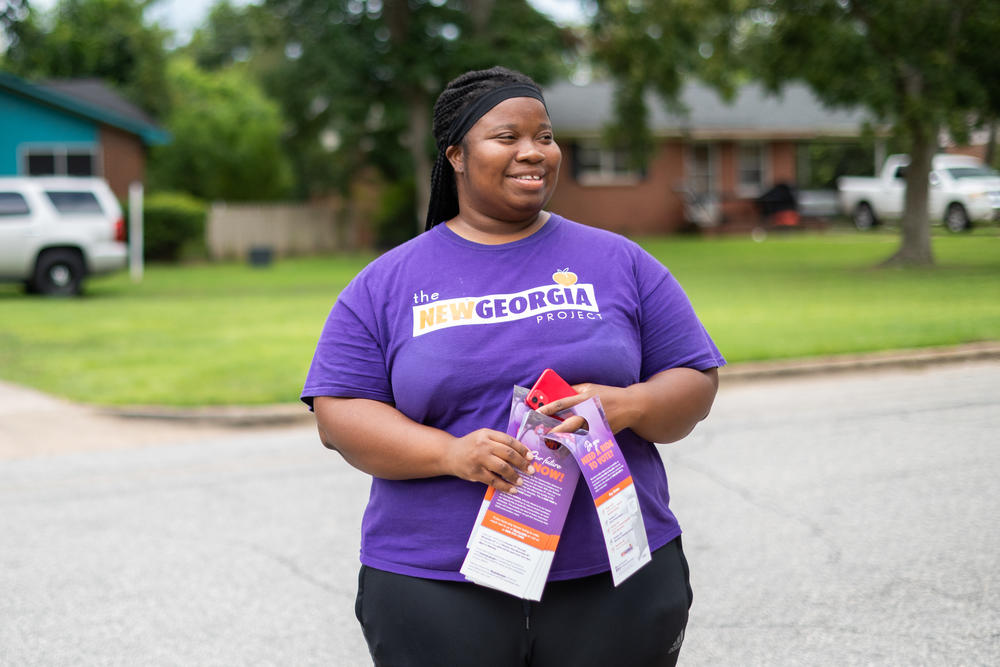 Shayla Jackson, an organizer with the New Georgia Project, canvasses on Aug. 29, 2022.
