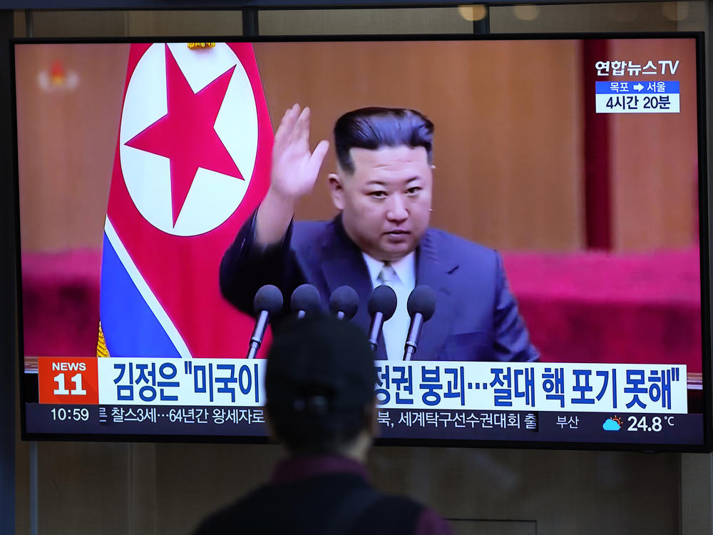 A man watches a TV screen showing a news program reporting with a file footage of North Korean leader Kim Jong Un, at the Seoul Railway Station in Seoul, South Korea, Friday, Sept. 9, 2022.