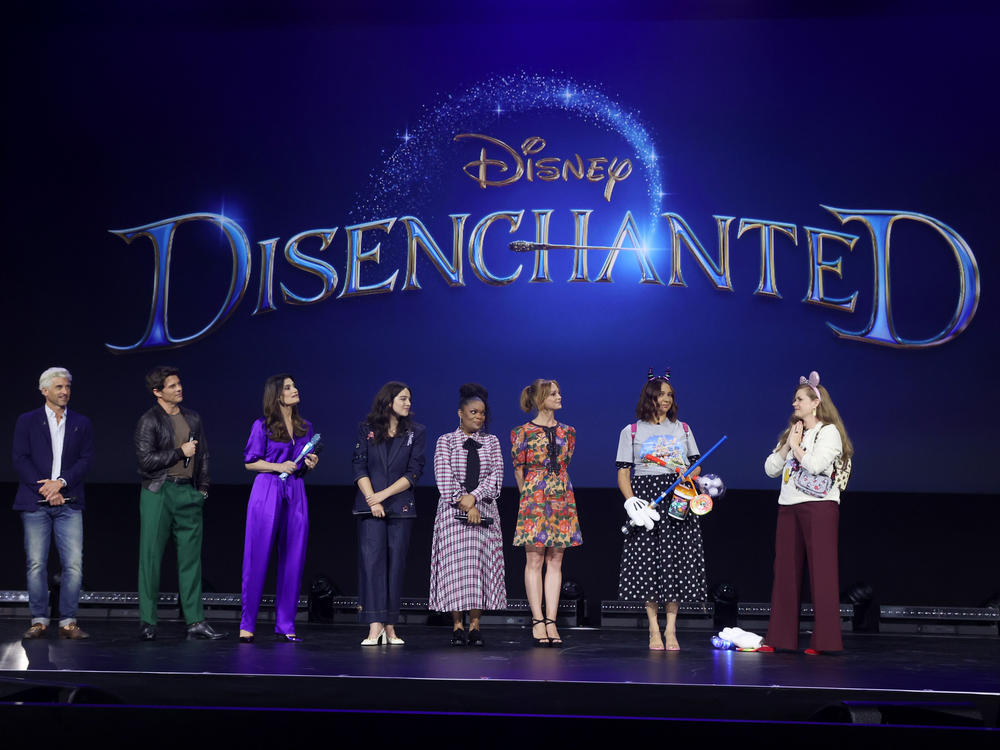 <em>Disenchanted</em> cast members Patrick Dempsey, James Marsden, Idina Menzel, Gabriella Baldacchino, Yvette Nicole Brown, Jayma Mays, Maya Rudolph and Amy Adams appear onstage Friday during the D23 Expo 2022 in Anaheim, Calif.