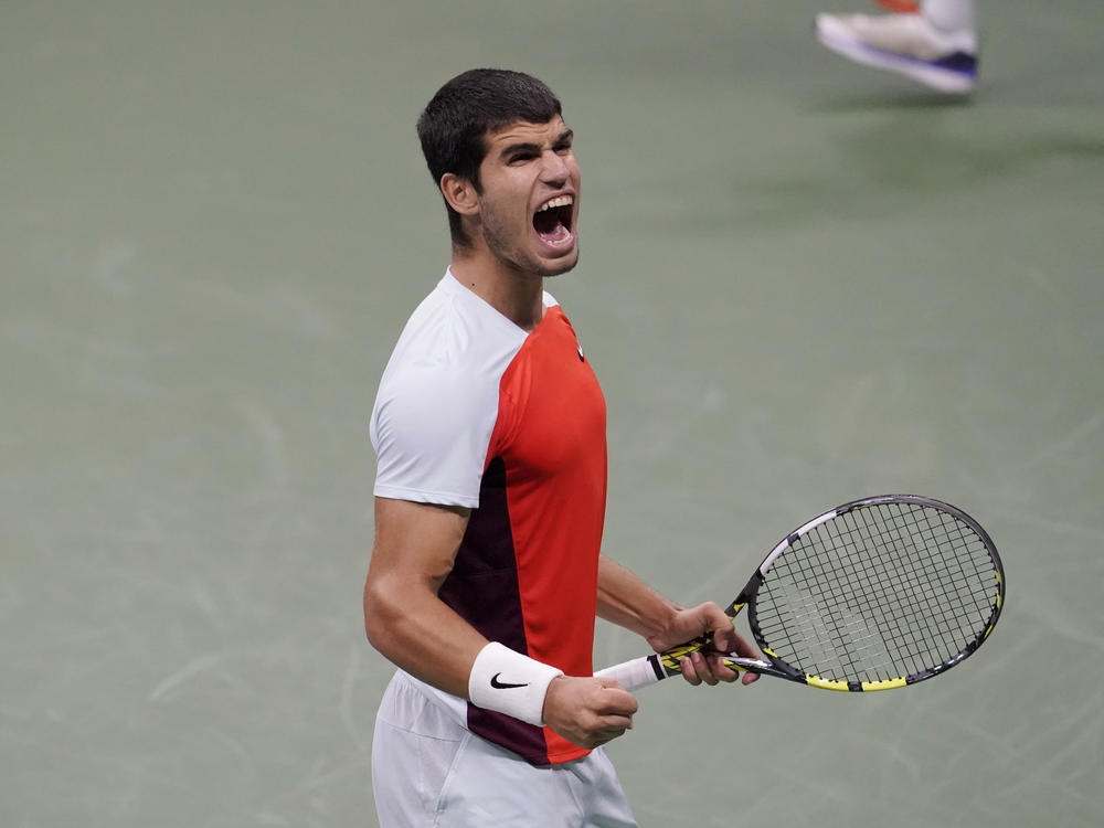 Carlos Alcaraz of Spain reacts after scoring a point against Norway's Casper Ruud during the men's singles final of the U.S. Open tennis championships on Sunday. Alcaraz won the tournament — becoming the youngest No. 1 player in men's tennis.