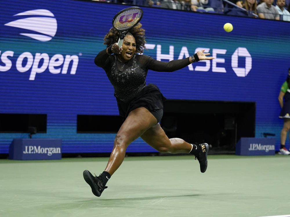 Serena Williams, of the United States, returns a shot to Ajla Tomljanovic, of Australia, during the third round of the U.S. Open tennis championships, Friday, Sept. 2, 2022, in New York. Williams' third-round defeat at by Ajla Tomljanovic had the largest audience of any tennis match in ESPN's 43-year history.