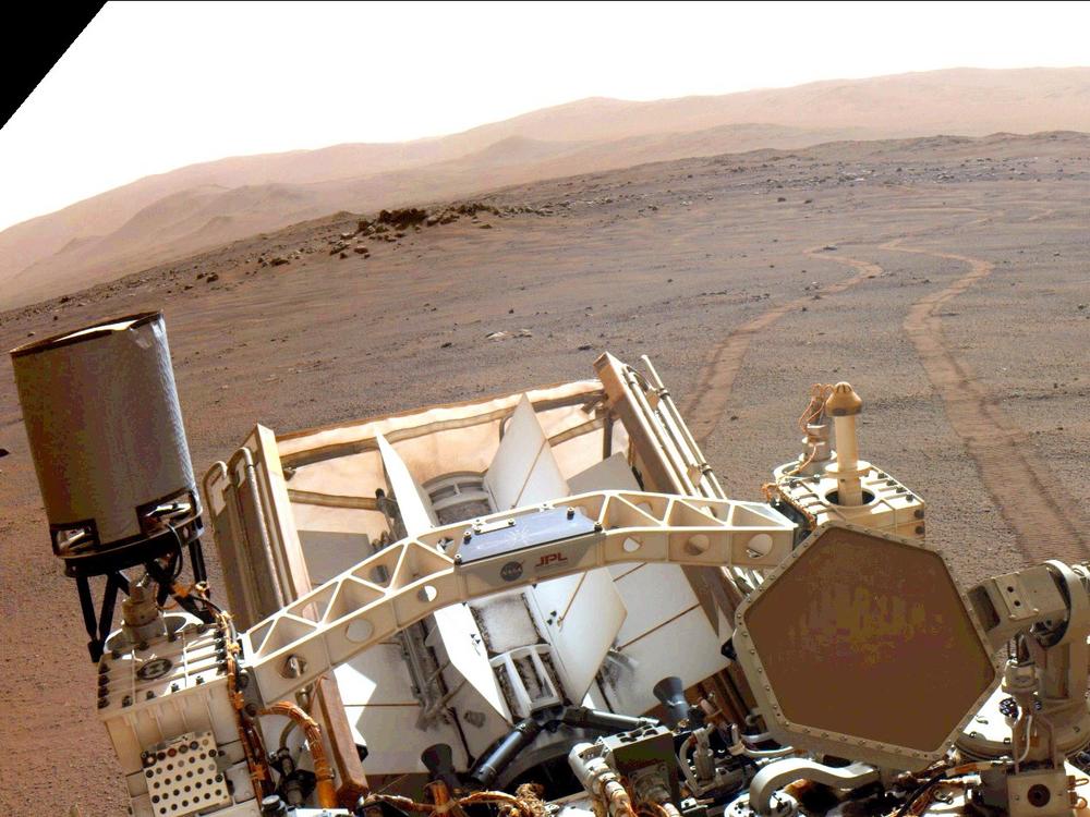 A NASA rover traversing the surface of Mars.