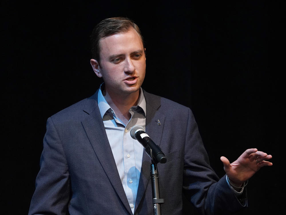 Matt Mowers speaks during the final primary debate before Tuesday's race.