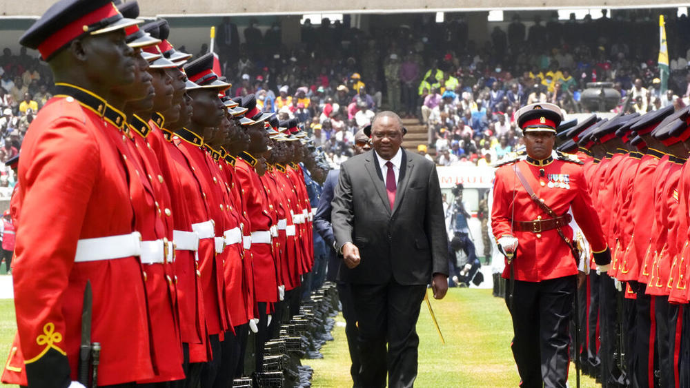 Outgoing President Uhuru Kenyatta inspects his last guard of honor during the swearing-in ceremony of Kenya's new president, William Ruto, on Tuesday.