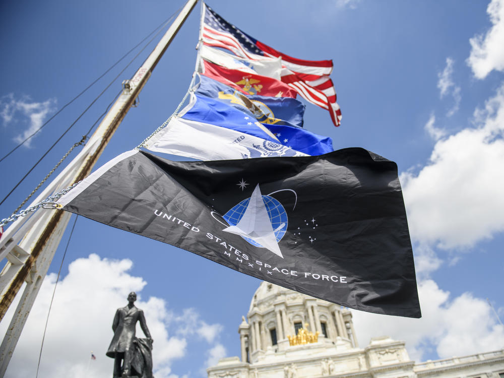 A United States Space Force flag flies along with flags of other armed service branches. The Space Force announced on Friday that the University of Puerto Rico at Mayagüez has joined its University Partnership Program.