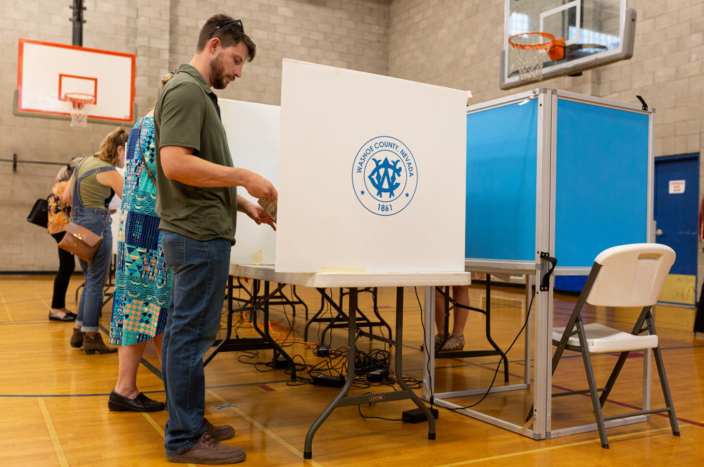 Voters cast their ballots at Reno High School for Nevada's statewide primaries on June 14.