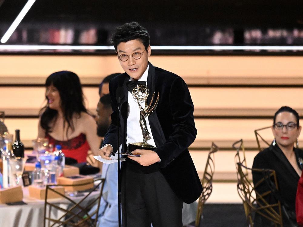 South Korean director Hwang Dong-hyuk accepts the award for Outstanding Directing For A Drama Series for <em>Squid Game</em> onstage during the 74th Emmy Awards.