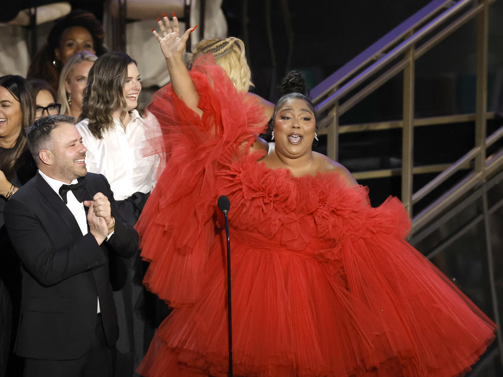 Lizzo (right) accepts the Outstanding Competition Program award for <em>Lizzo's Watch Out For The Big Grrrls</em> onstage during the 74th Primetime Emmys.