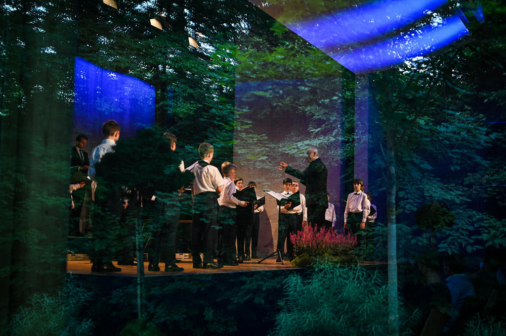 The Regensburger Domspatzen choir sing at a concert in Lappersdorf, Germany, on July 15, 2021.