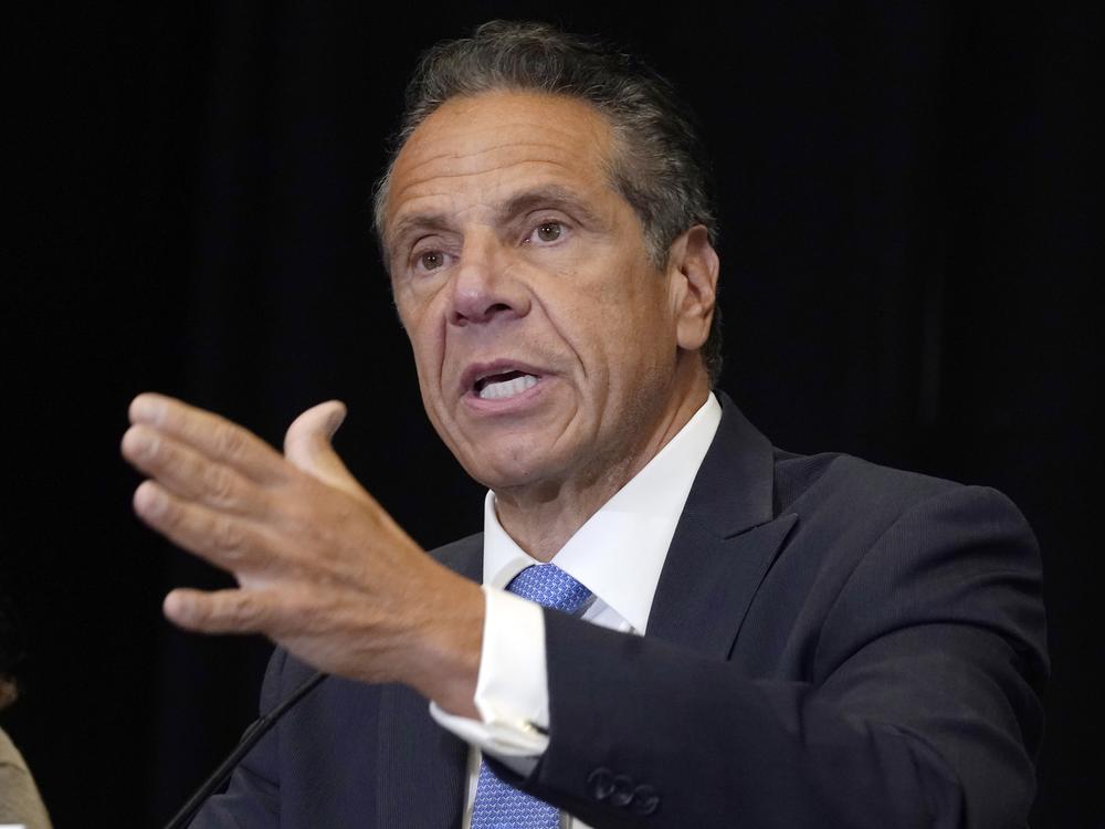Then-New York Gov. Andrew Cuomo speaks during a news conference at New York's Yankee Stadium on July 26, 2021. Cuomo sued Attorney General Letitia James on Thursday, arguing that James violated state law by denying him public assistance for his defense in a sexual harassment claim.