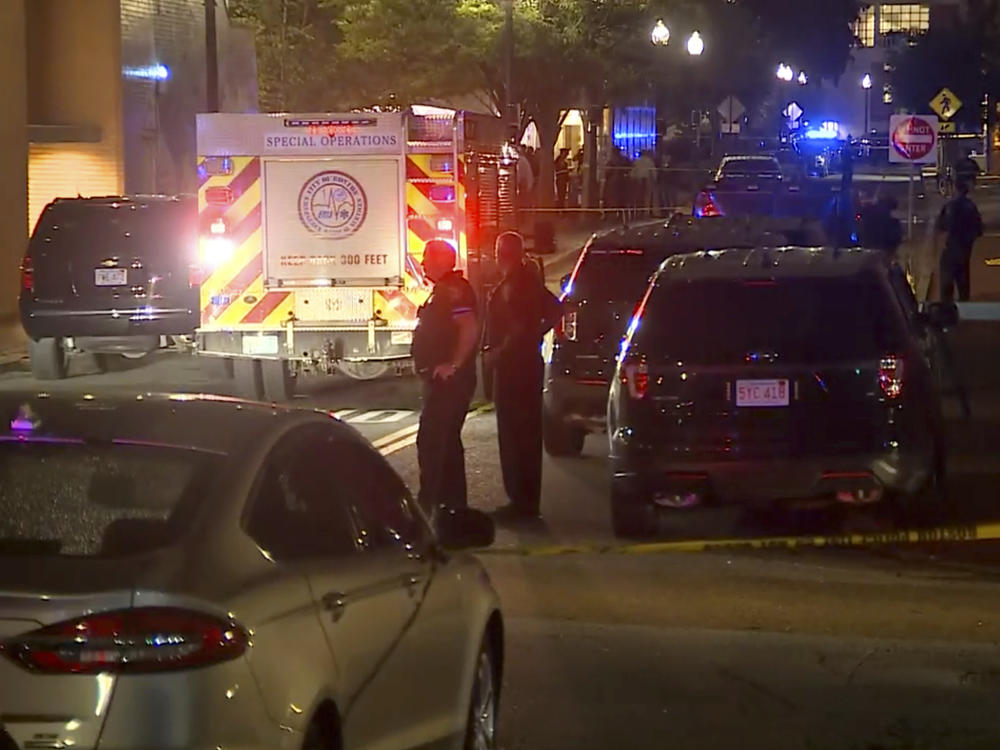 Police and emergency personnel respond the scene of an explosion in Boston on Tuesday. A package exploded on the campus of Northeastern University and the college said a staff member suffered minor injuries.