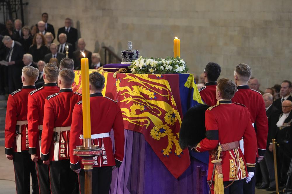 The coffin of Queen Elizabeth II arrives at Westminster Hall in London.