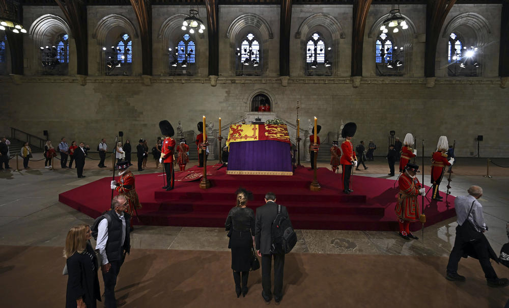 Members of the public file past the coffin of Queen Elizabeth II inside Westminster Hall in London on Wednesday.