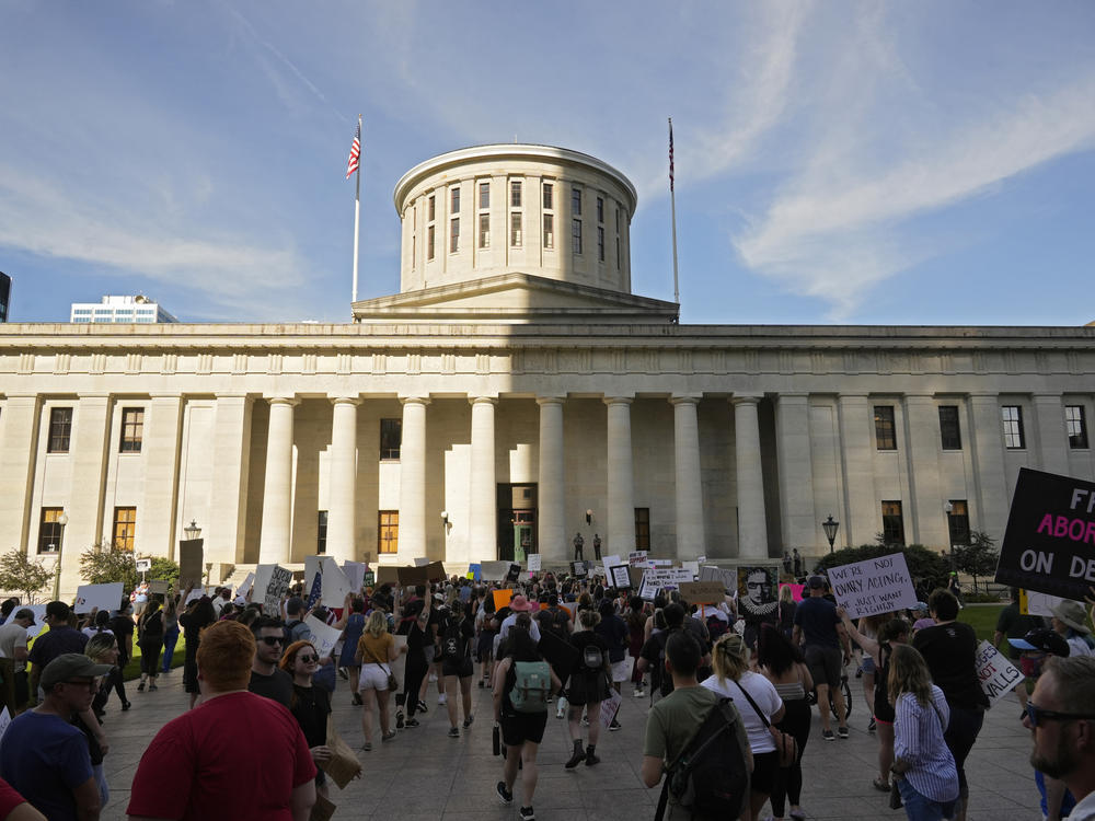 Protesters rally at the Ohio Statehouse in Columbus in support of abortion rights after the U.S. Supreme Court overturned Roe vs. Wade on June 24, 2022. A judge temporarily blocked Ohio's ban on virtually all abortions on Wednesday, again pausing a law that took effect after federal abortion protections were overturned by the Supreme Court in June.