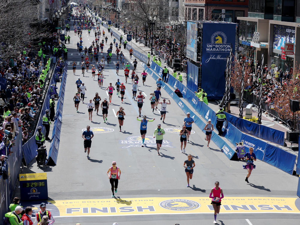Runners near the finish line during the 126th Boston Marathon on April 18, 2022.