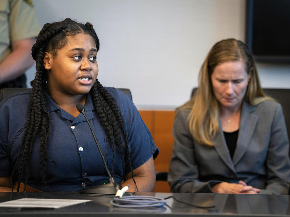 Pieper Lewis, left, speaks with Polk County District Judge David M. Porter during her sentencing hearing on Sept. 13. Donations are pouring in to help Lewis, a 17-year-old sex trafficking victim who was ordered by the court to pay $150,000 to the family of a man she stabbed to death after he raped her.