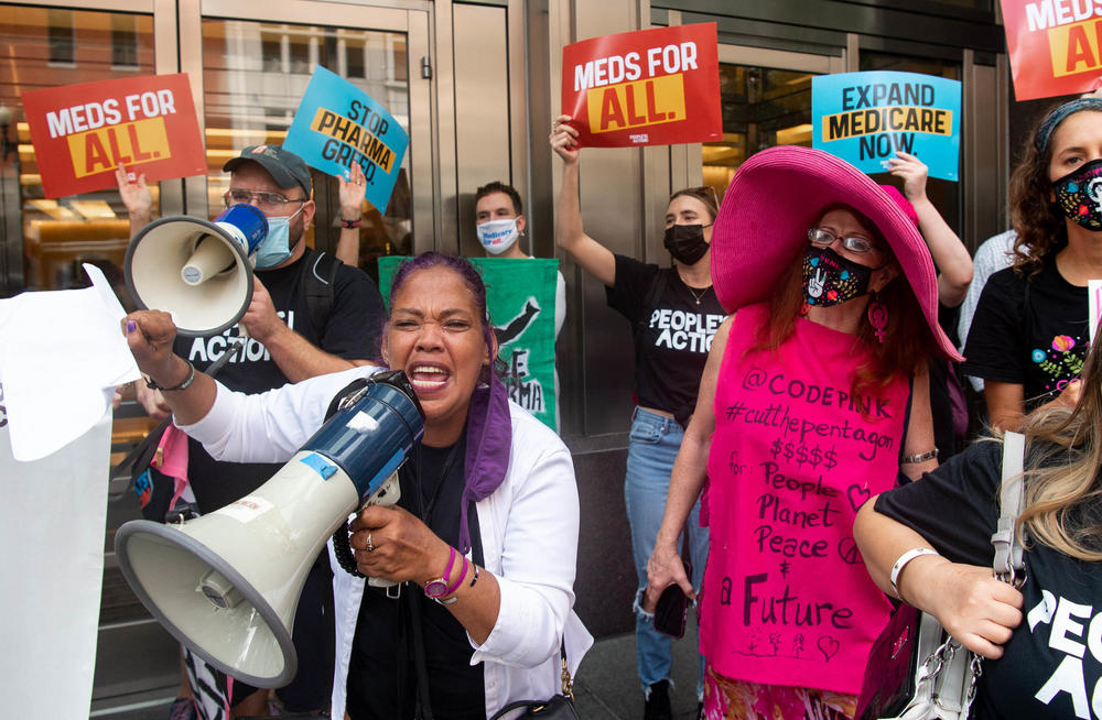 Demonstrators from the People's Action protest pharmaceutical companies' lobbying against allowing Medicare to negotiate lower prescription drug prices, during a rally outside Pharmaceutical Research and Manufacturers of America (PhRMA) headquarters, Washington, D.C., September 21st, 2021.