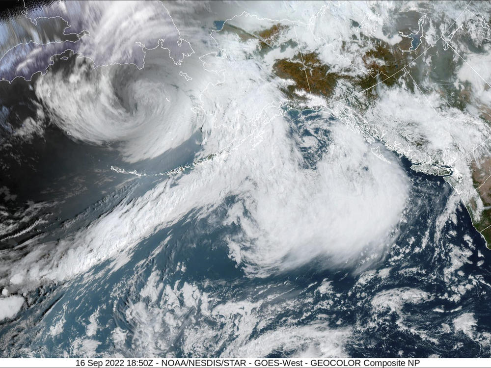 This image provided by the National Hurricane Center and Central Pacific Hurricane Center/National Oceanic and Atmospheric Administration shows a satellite view of Alaska on Friday. On the outlying Adak Island, wind gusts reached 75 mph.