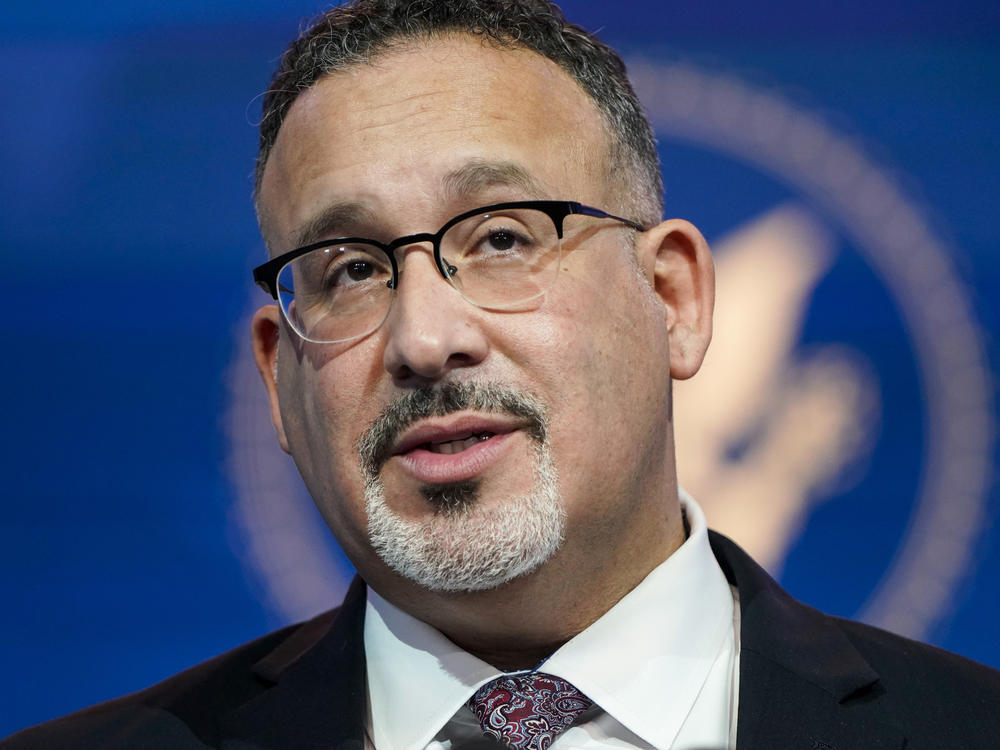 U.S. Secretary of Education Miguel Cardona spoke to NPR during the Pittsburgh stop of his back-to-school bus tour.