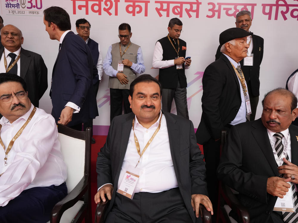 Gautam Adani (center) attends the UP Investors Summit in the northern Indian state of Uttar Pradesh, on June 3.