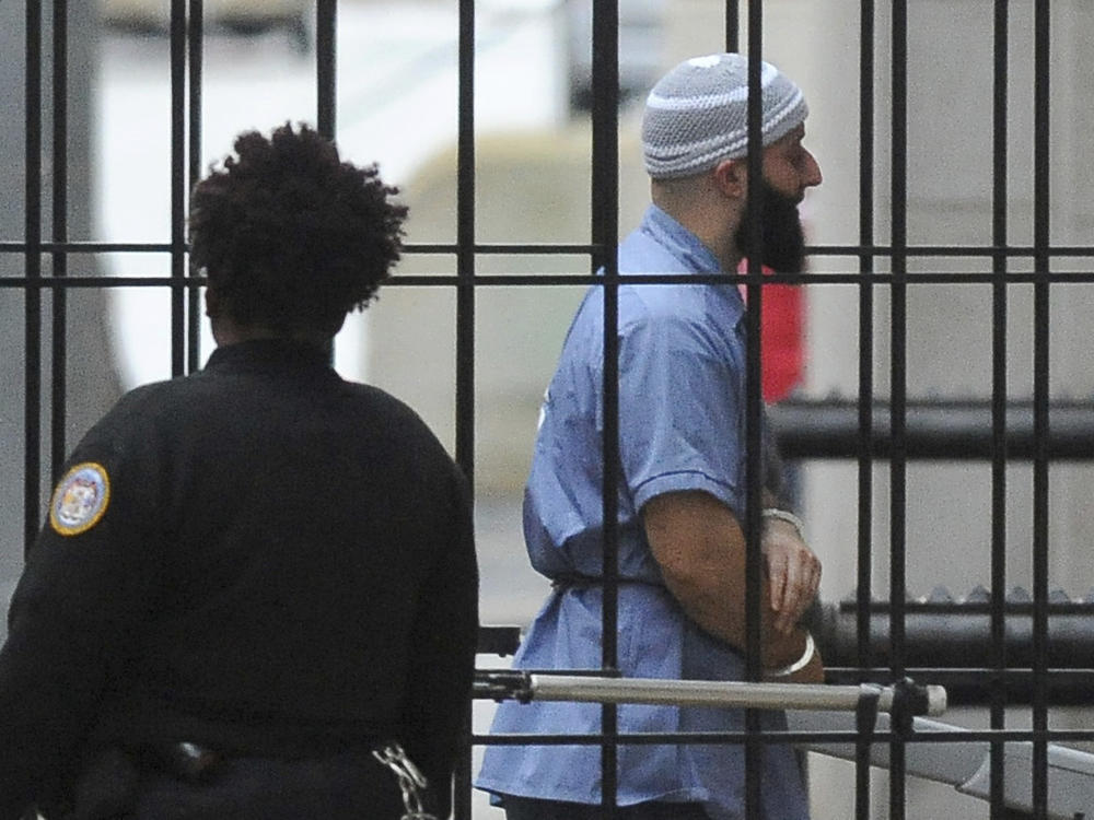 Adnan Syed enters a Baltimore courthouse prior to a hearing on Feb. 3, 2016. A court hearing has been set for Monday to consider a request from prosecutors to vacate his 2000 murder conviction.