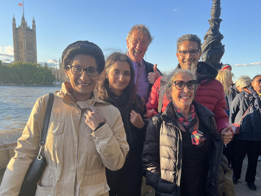 Teresa Bhatti, far left, said she was looking forward to meeting up later with some of the new friends she met in line.