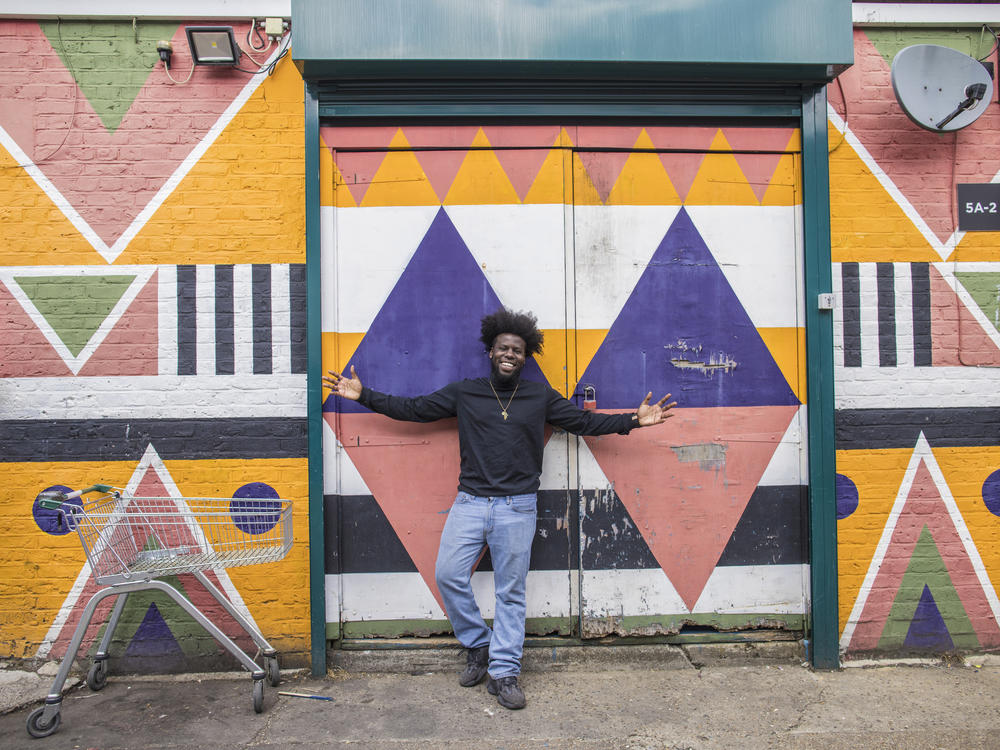 Anjelo Disons poses for a picture after speaking about his views on the recent events surrounding the queen's death and the monarchy at the Peckham Festival in London.