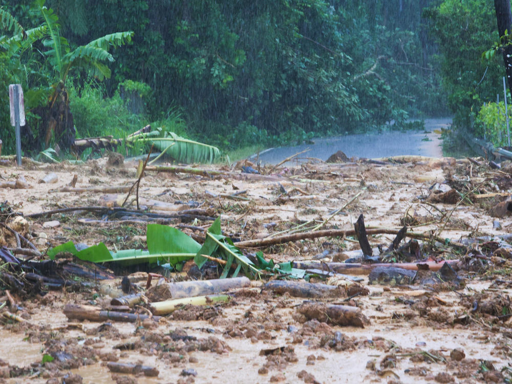 A road is blocked by a mudslide caused by Hurricane Fiona in Cayey, Puerto Rico, on Sunday.