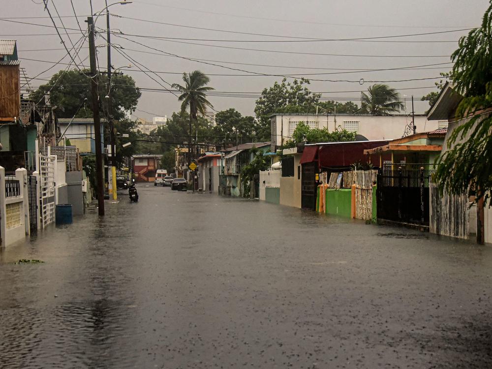 A flooded road is seen during the passage of Hurricane Fiona in Villa Blanca, Puerto Rico, on Sunday.