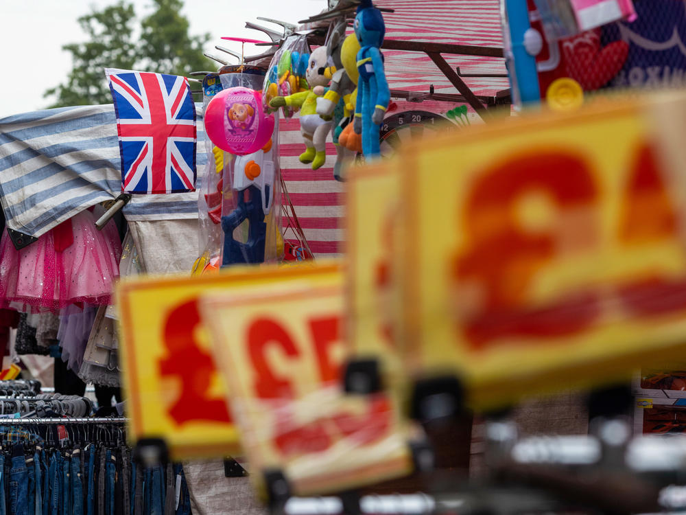 A British Union Jack flies above a clothing market stall in Barking, U.K., last week.