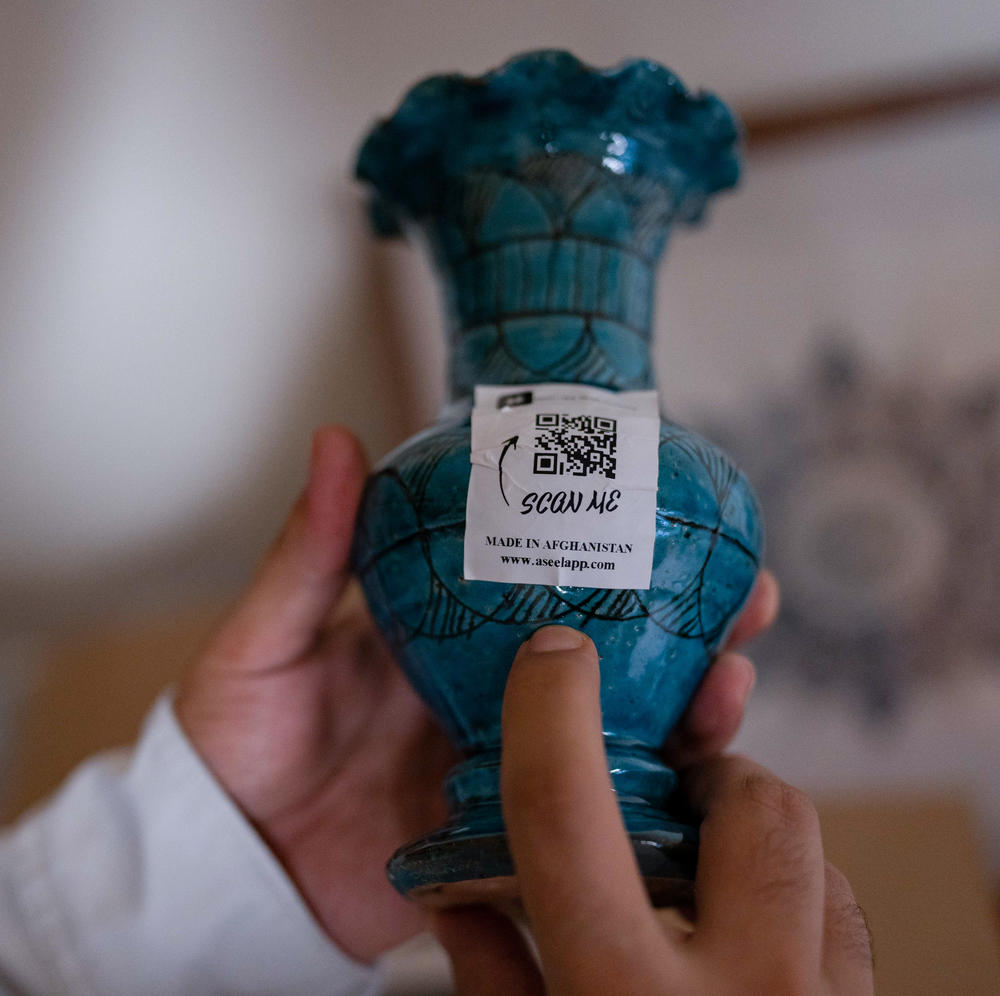 Nasrat Khalid started the online business Aseel to bring Afghan arts and crafts — like this vase — to a global market.