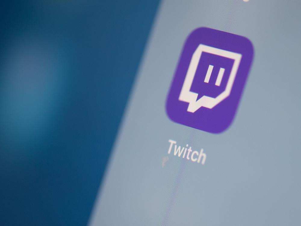 A Twitch logo is seen on the screen of a tablet in this 2019 photo.