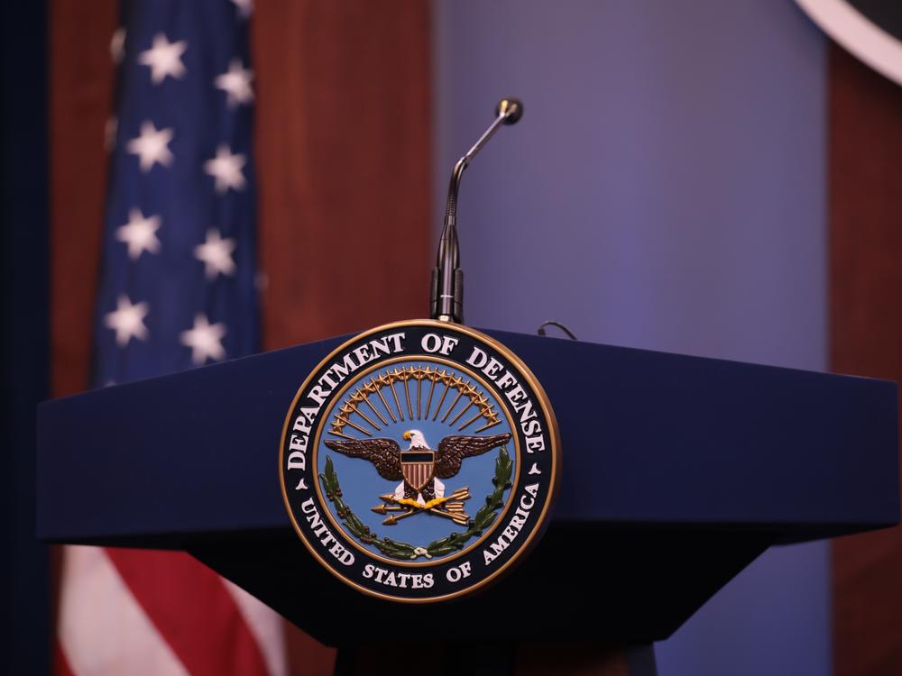 The Department of Defense logo is seen on the desk ahead of the press conference on Jan. 14, 2020.