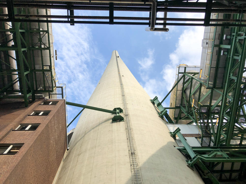 The chimney of the Evonik coal plant in Marl, Germany, on Sept. 13. This coal-fired power plant helps power a chemical park run by Evonik. The park employs more than 10,000 people and the plant, which was scheduled to shut down this year, will be open for at least another year to replace natural gas that has been cut by Russia.