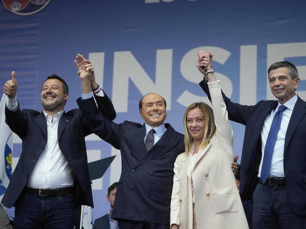 From left, The League's Matteo Salvini, Forza Italia's Silvio Berlusconi, Brothers of Italy's Giorgia Meloni and Noi Con l'Italia's Maurizio Lupi attend the center-right coalition closing rally in Rome on Thursday. If polling is correct, Italians will elect their country's most right-wing government since the end of World War II on Sunday.