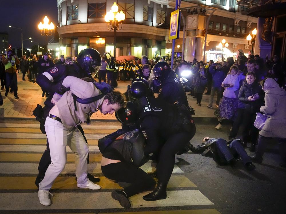 Riot police detain demonstrators during a protest against mobilization in Moscow on Wednesday. Russian President Vladimir Putin ordered a partial mobilization of reservists in Russia, effective immediately.