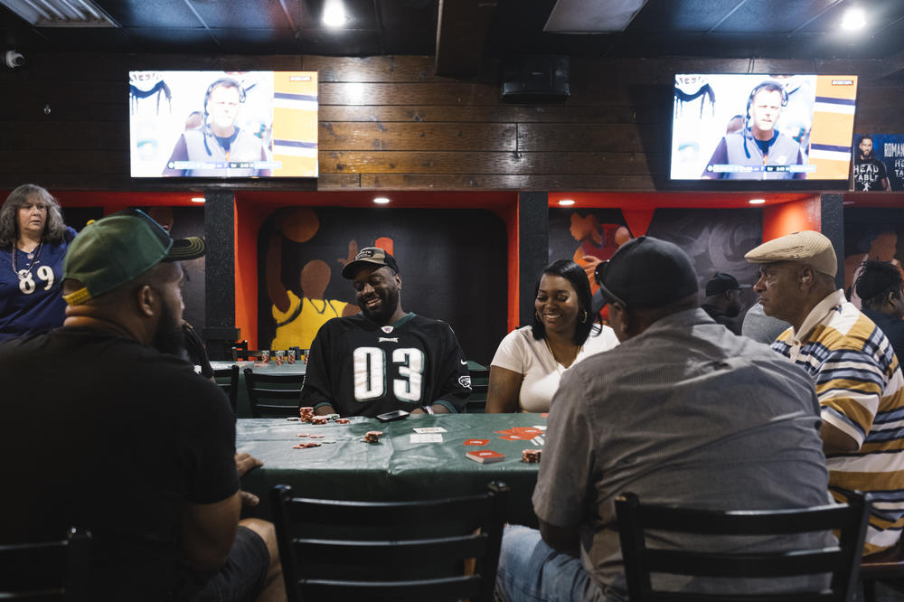 Randy Bruton plays in the poker tournament at the Hamilton Sports Bar.