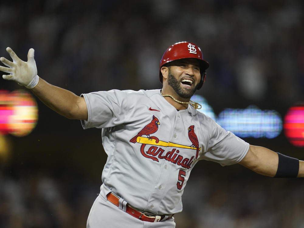 The St. Louis Cardinals' Albert Pujols watches after hitting his 700th career home run on Friday in a game against the Los Angeles Dodgers.