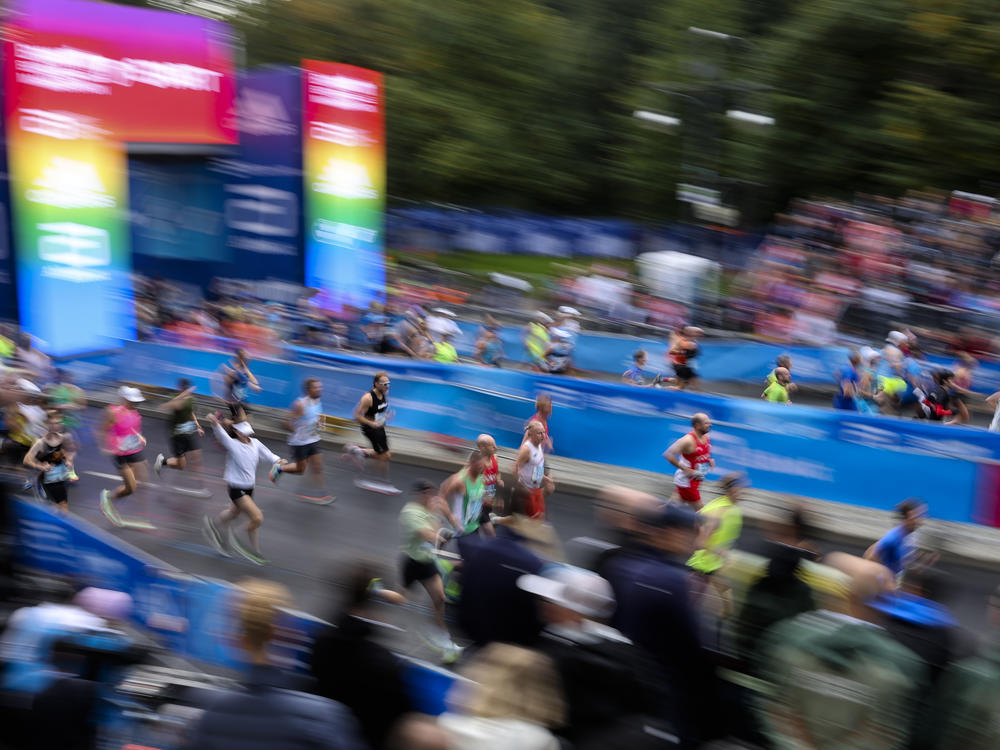 Athletes run at the start of the Berlin Marathon in Berlin on Sunday.