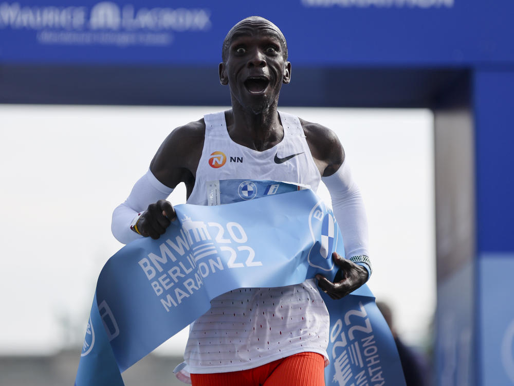 Kenya's Eliud Kipchoge crosses the line to win the Berlin Marathon in Berlin on Sunday.