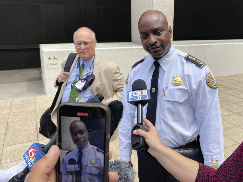 New Orleans Police Superintendent Shaun Ferguson talks to reporters outside the federal courthouse in New Orleans on Aug. 17, 2022. Hoping to beef up a dwindling police force amid a rise in violent crime, New Orleans officials announced a three-year $80 million plan Thursday, Sept. 8, 2022, offering raises for all officers, free health care and $30,000 in incentive payments for new hires.