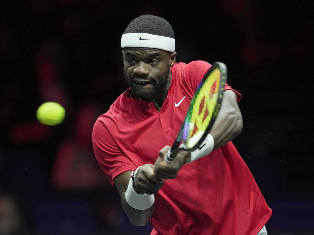 Team World's Frances Tiafoe plays a return to Team Europe's Stefanos Tsitsipas during their singles tennis match on the third day of the Laver Cup tennis tournament at the O2 arena in London on Sunday.